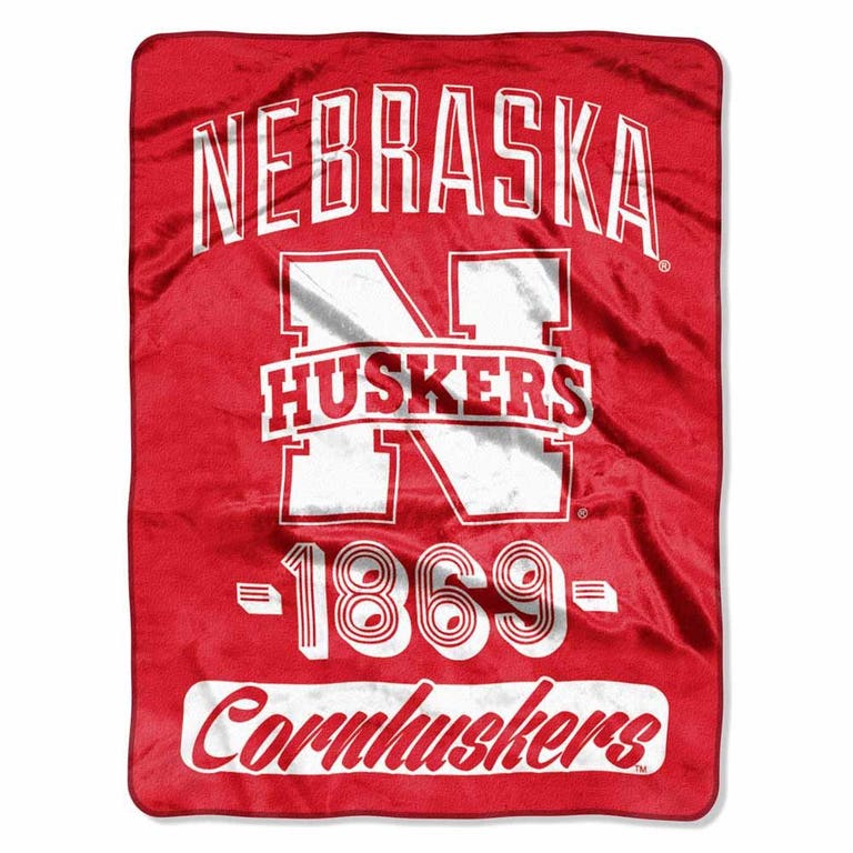 Nebraska Huskers Blanket 46x60 Raschel Varsity Design Rolled