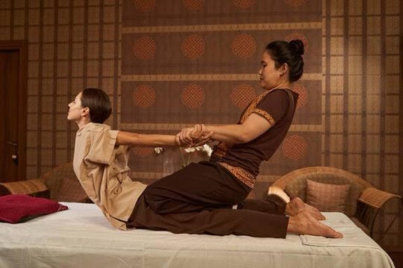 Thai dry massage on the mat