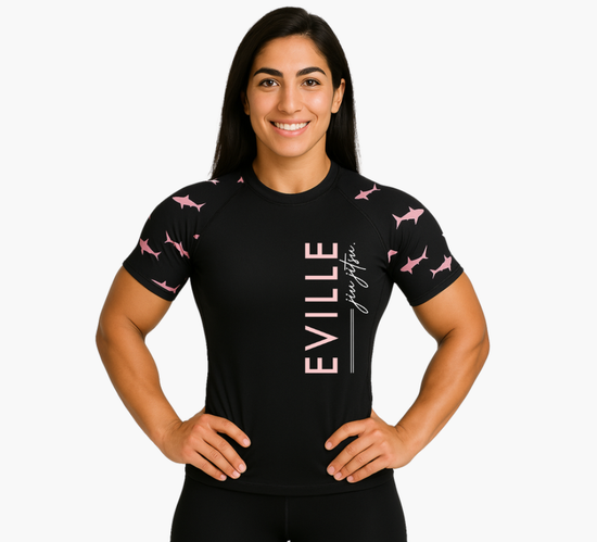 Pink Shark Rashguard with Eville Cursive Jiu Jitsu Sideways